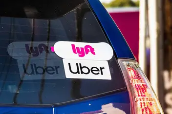 https://thesmarthomespot.com/wp-content/uploads/2021/12/lyft-uber-sign.jpg?ezimgfmt=rs:352x235/rscb1/ng:webp/ngcb1